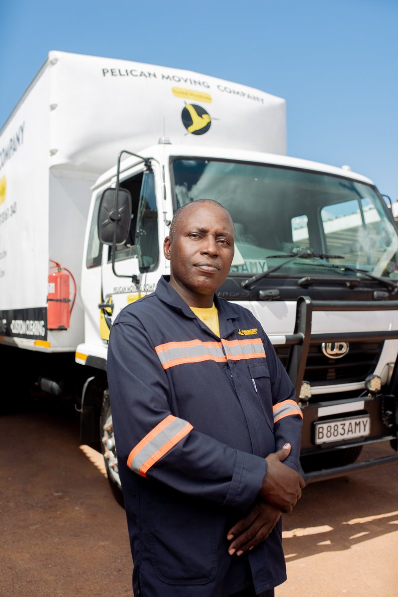 Pelican Moving truck and driver